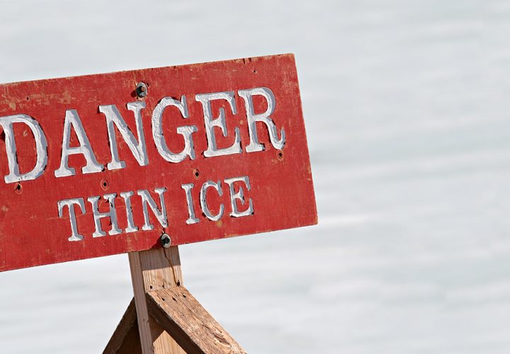 Danger Thin Ice sign on ice pond - ClearPath