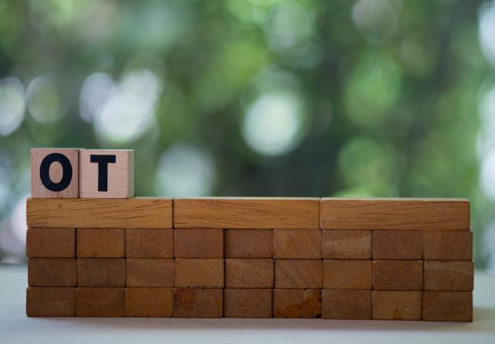 Text block "OT" mean overtime. Overtime and exhausting work.