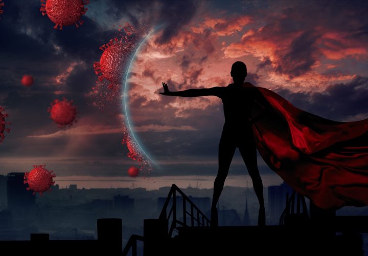 Portrait of young hero woman with super person red cape protect city