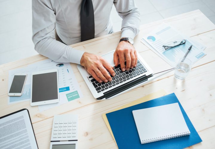 office worker revisiting independent contractor management strategies